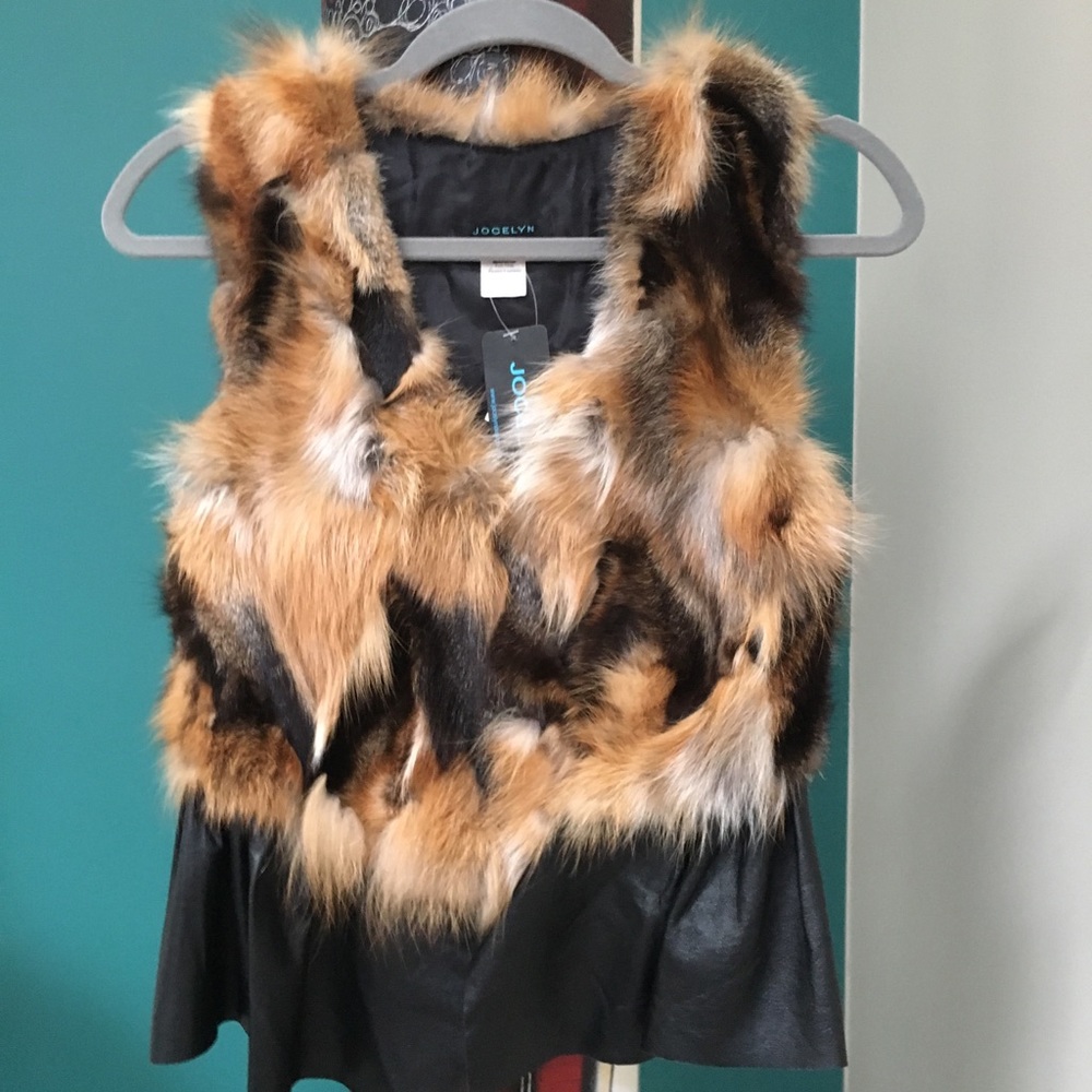 Jocelyn red fox fur vest with leather ruffle.